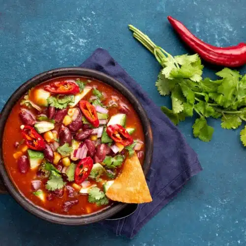 Mouthwatering Mexican Hamburger Soup In A Bowl With Toppings